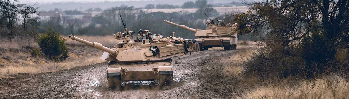 two Abrams M1A2 SEPv3 Main Battle Tanks