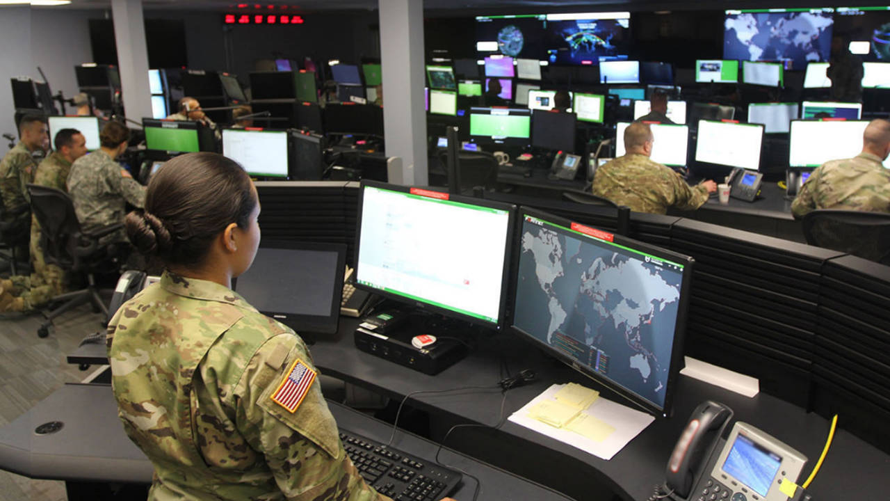 female solider in a command center